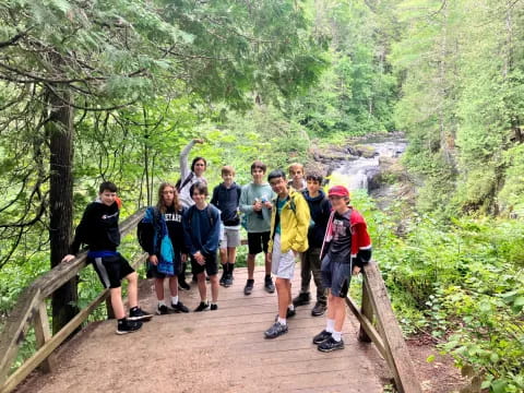 a group of people on a bridge