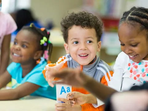 a group of children smiling