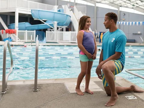 a man and a woman by a pool