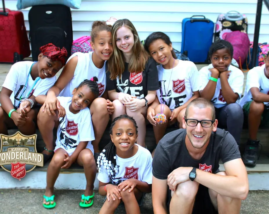 a group of people posing for a photo