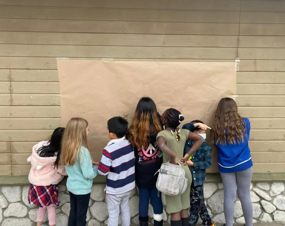 a group of people standing outside