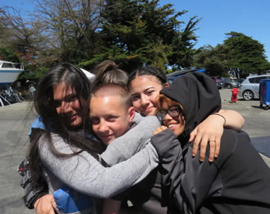 a group of people posing for the camera