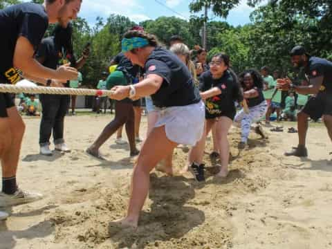 a group of people playing volleyball