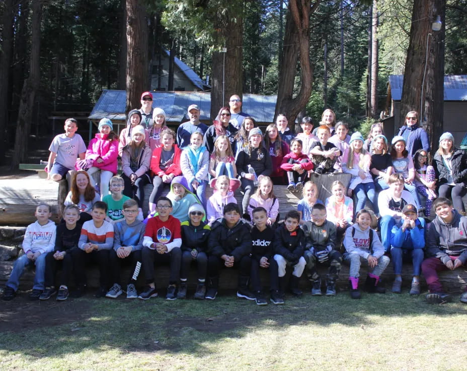 a group of people posing for a photo