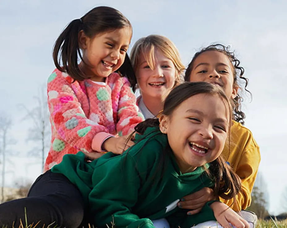 a group of girls smiling