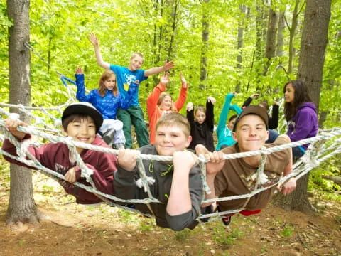 a group of kids in a tree