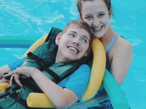 a man and a woman in a pool