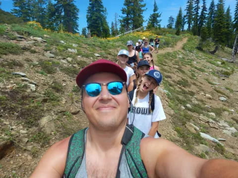 a group of people on a rocky trail
