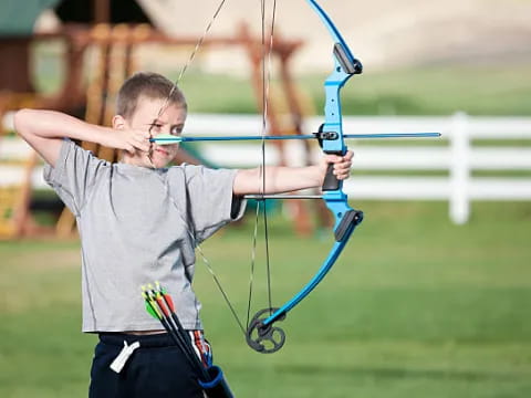 a boy playing archery