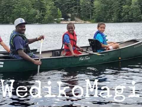 a group of people in a canoe