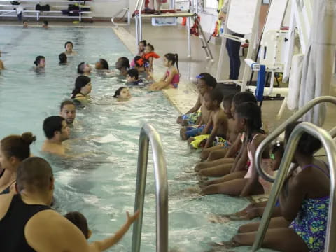 a group of people in a pool