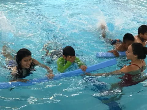 a group of people in the water