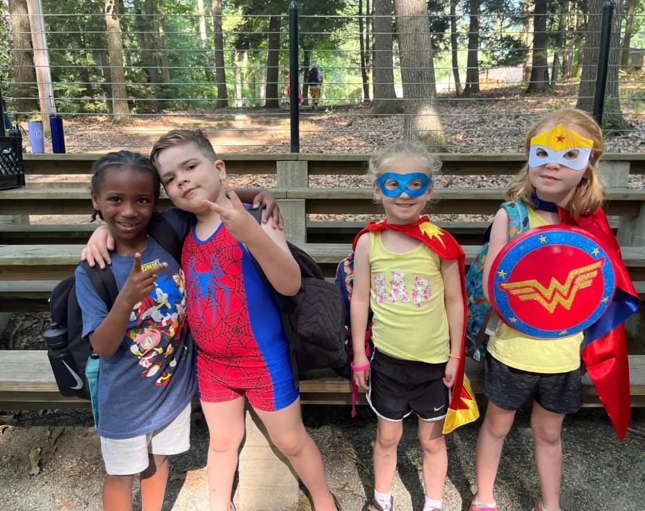 a group of children wearing clothing