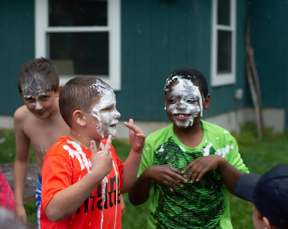 a group of children with paint on their faces