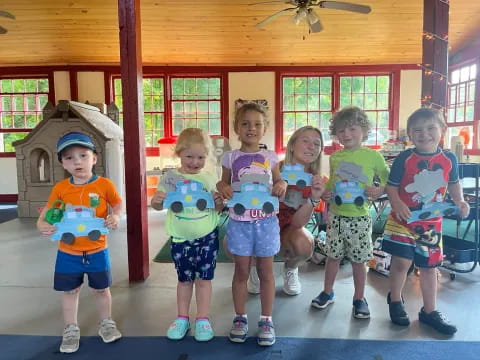 a group of children posing for a photo