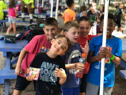 a group of children posing for a photo