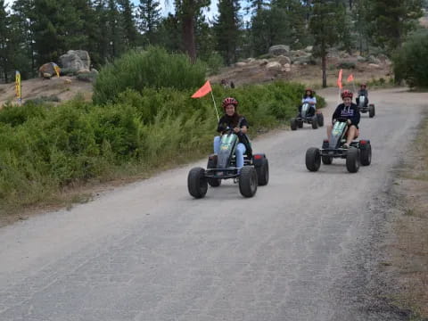 a group of people riding segways on a road