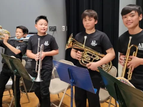 a group of boys playing instruments