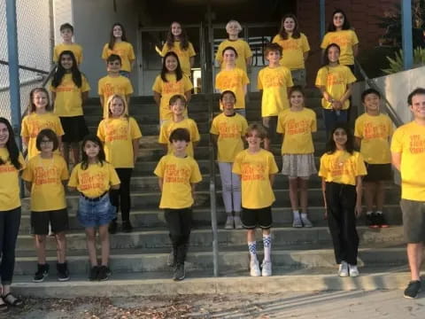 a group of people wearing matching t-shirts