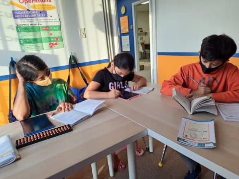 a group of students studying in a classroom