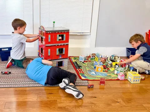 a group of kids playing with toys