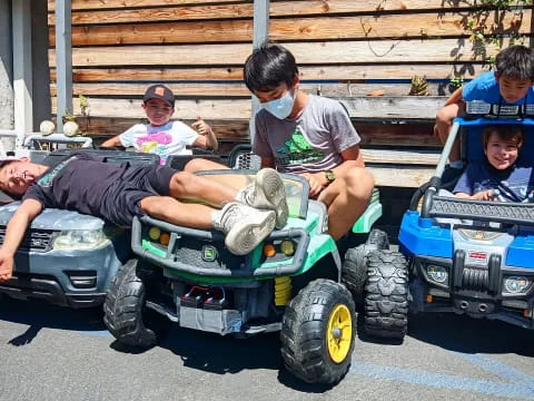 a group of people on a go kart