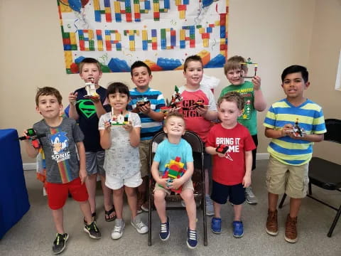 a group of kids posing for a photo