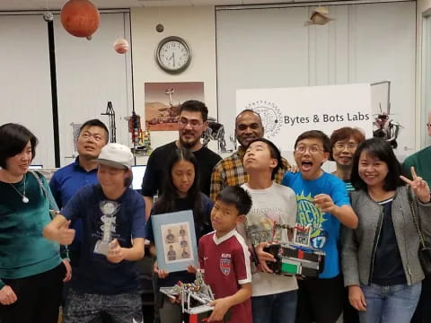 a group of people posing for a photo