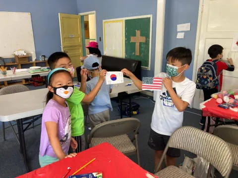 a group of children wearing masks