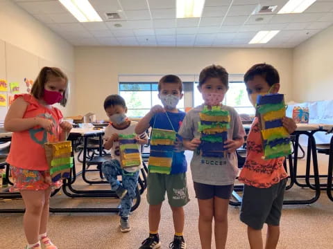 a group of children wearing matching t-shirts