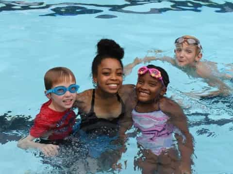 a group of people in a pool