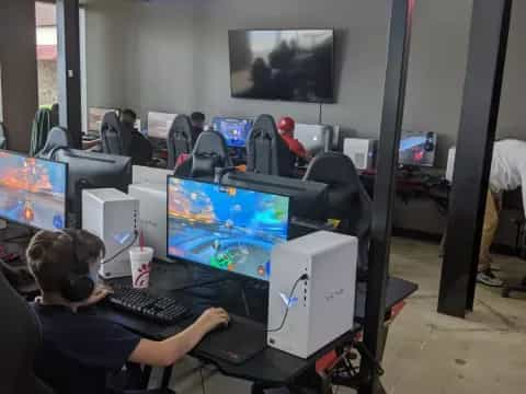 a group of people sitting at computers