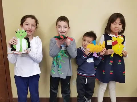 a group of children holding toys