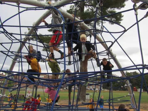a group of people on a rope
