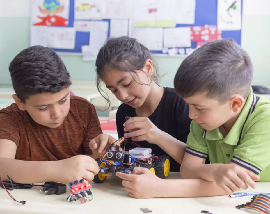 a group of children playing with a toy