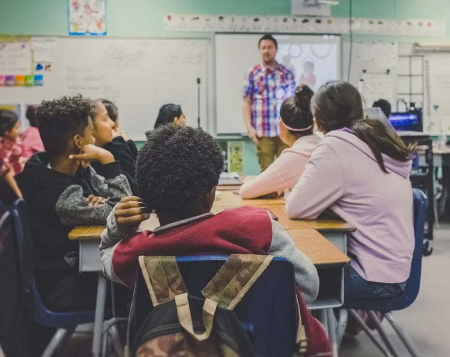 a group of people in a classroom