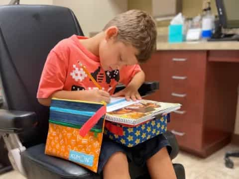 a boy reading a book