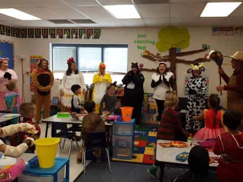 a group of children in a classroom