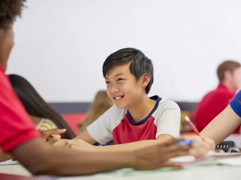 a group of people sitting at a table