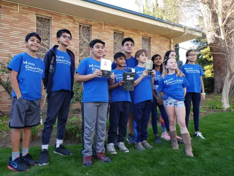 a group of people posing for a photo