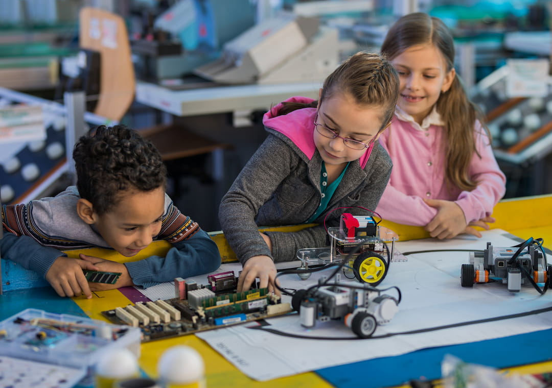 a group of children playing with toys