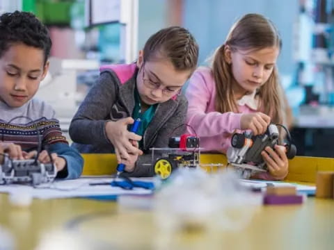 a group of kids playing with toys