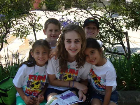 a group of children posing for a photo