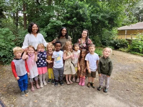 a group of people posing for a photo