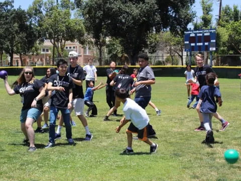 a group of people playing football