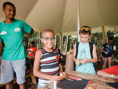 a group of people in a tent