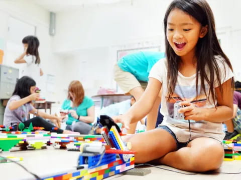 a girl sitting on the floor