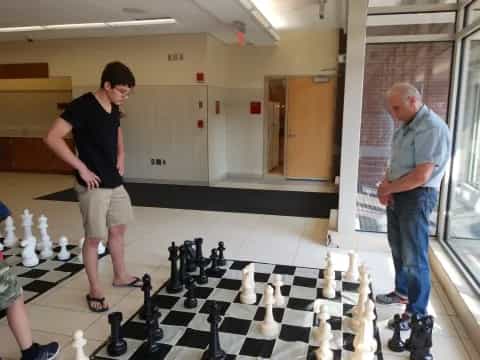 a few men playing chess
