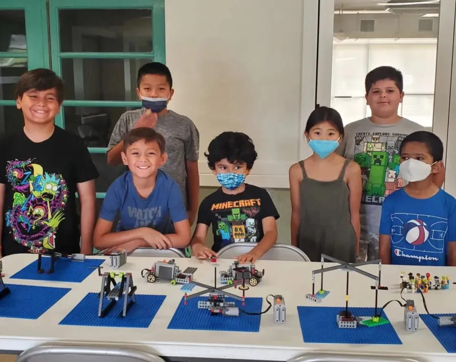 a group of kids wearing masks