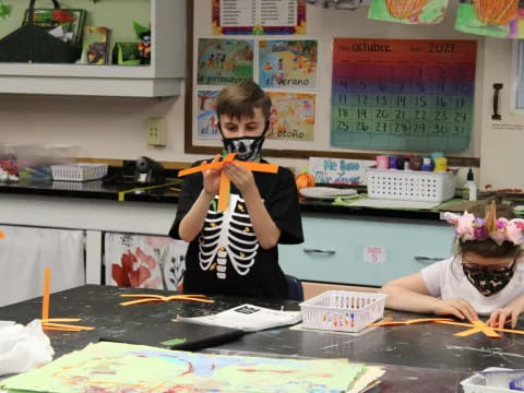 a boy wearing a mask